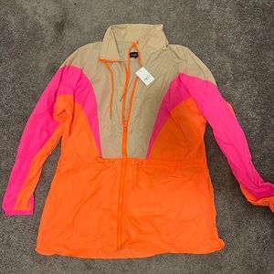 orange/pink/tan thin windbreaker